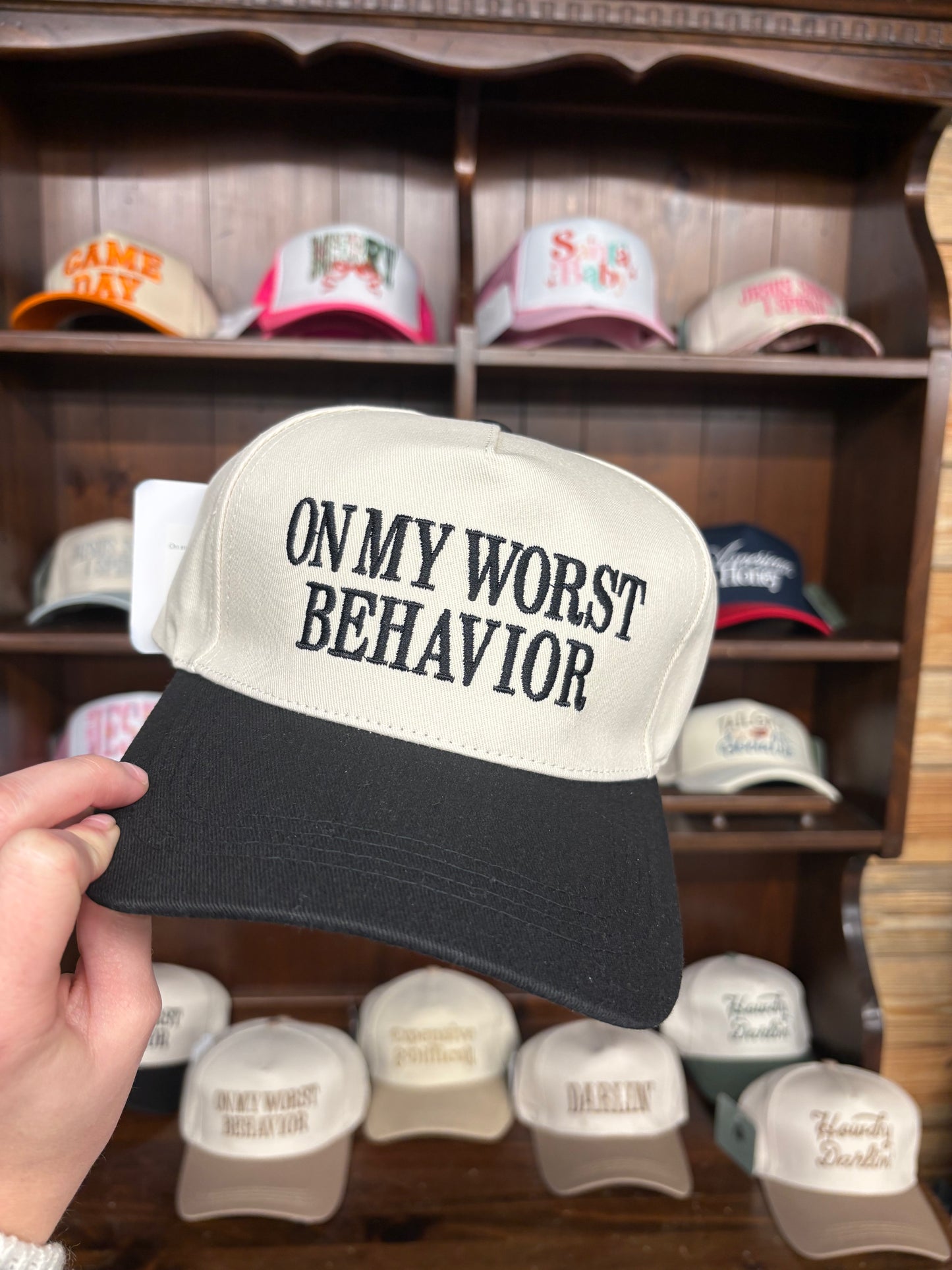On my worst behavior black Cap